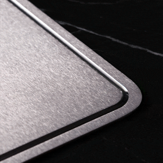 Video of Taima Titanium Cutting Board V2 in action, showing its durability and ease of cleaning.