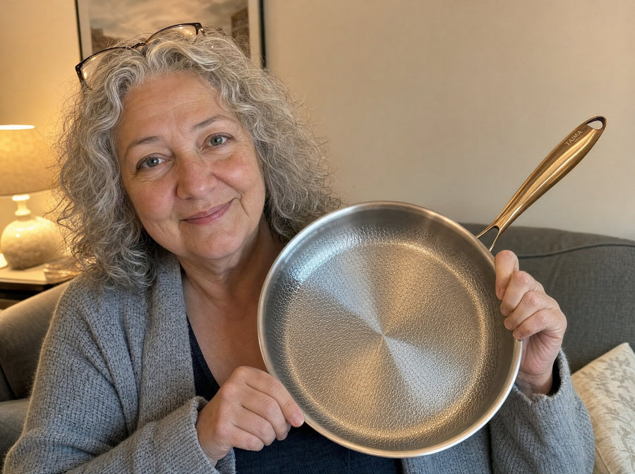 Customer holding her Taima pan at home