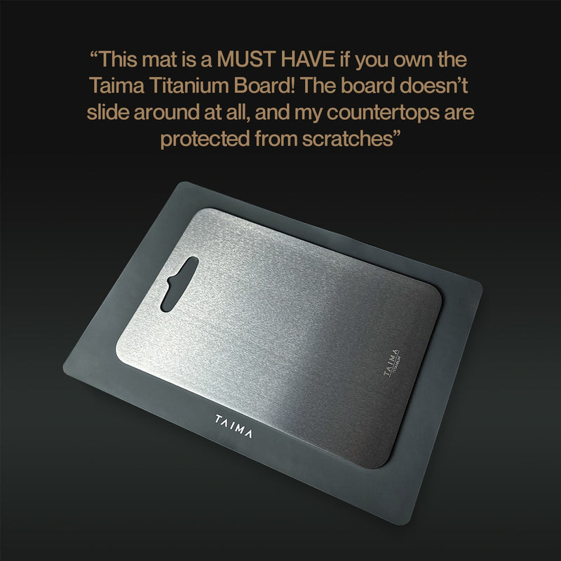 Taima Titanium Board with protective mat on a dark background